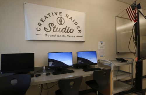 Creative art studio at Cedar Ridge High School classroom with computers.