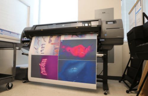 Large poster printer printing out colorful